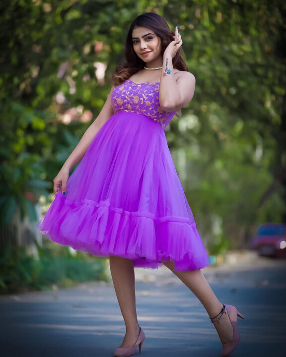 Susmitha Anala stills in purple party wear outfit