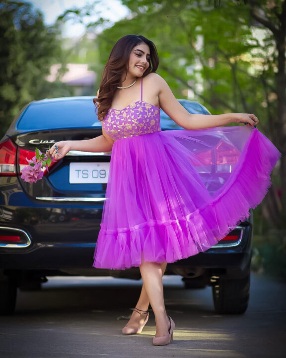 Susmitha Anala stills in purple party wear outfit