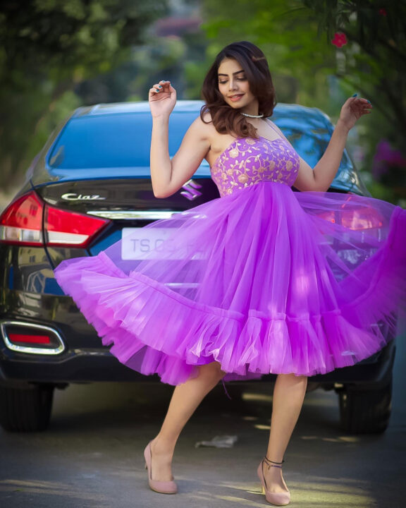 Susmitha Anala stills in purple party wear outfit