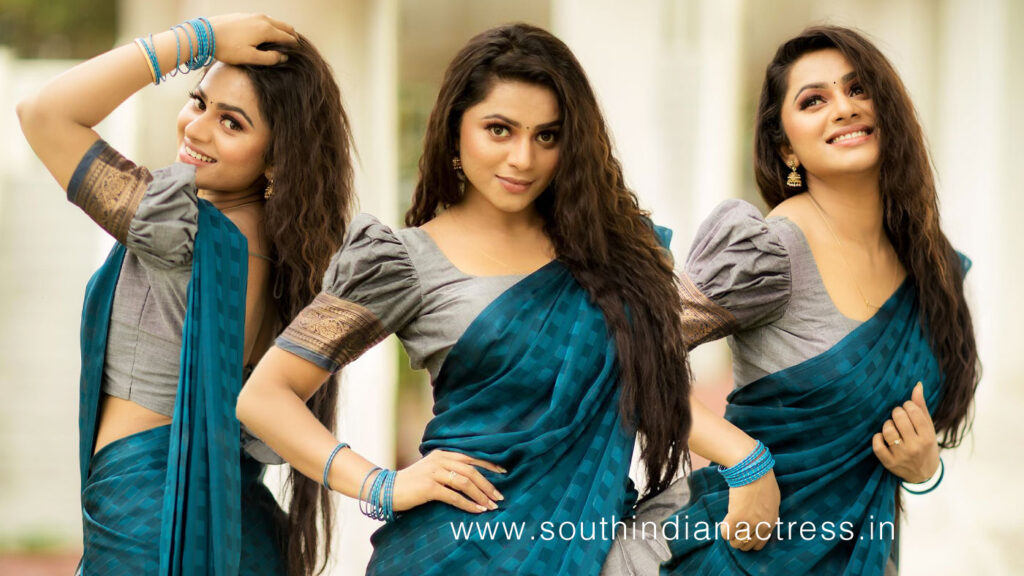 Delna Davis in peacock blue cotton half saree