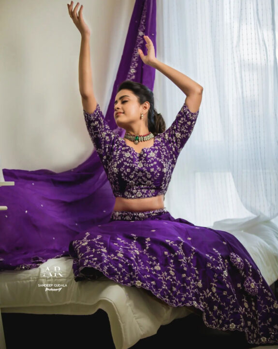 Thanuja Puttaswamy in purple lehenga photos