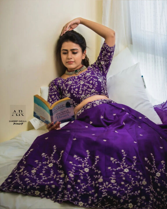 Thanuja Puttaswamy in purple lehenga photos