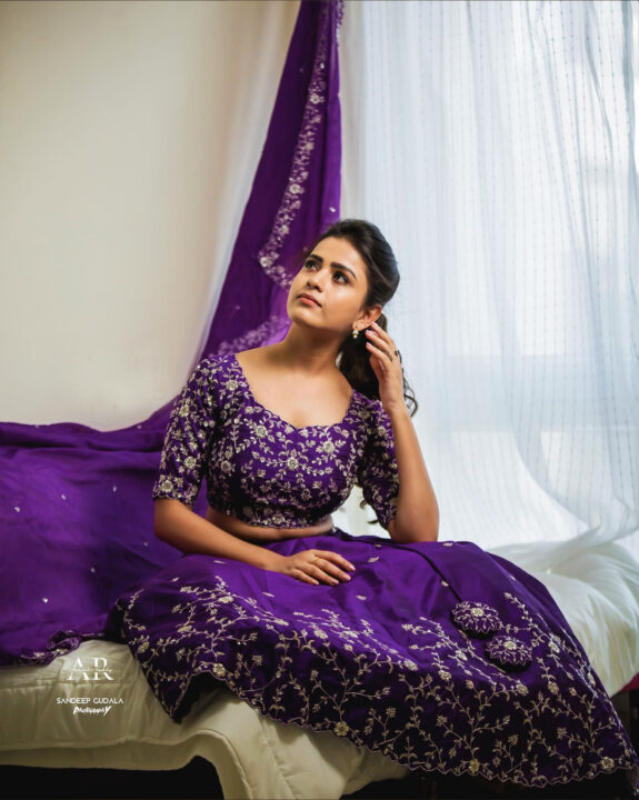 Thanuja Puttaswamy in purple lehenga photos