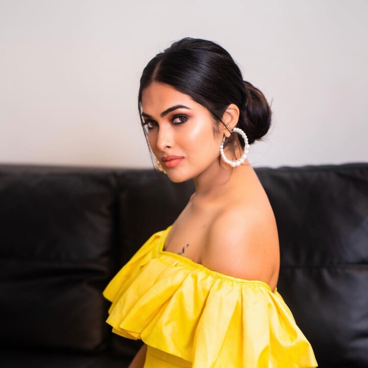 Divi Vadthya in yellow off shoulder outfit