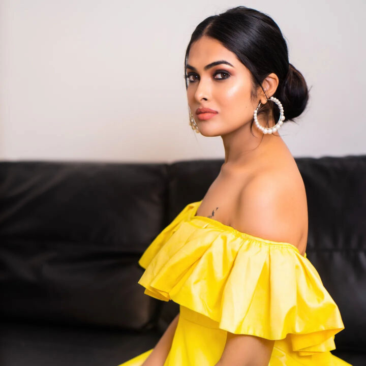 Divi Vadthya in yellow off shoulder outfit photos