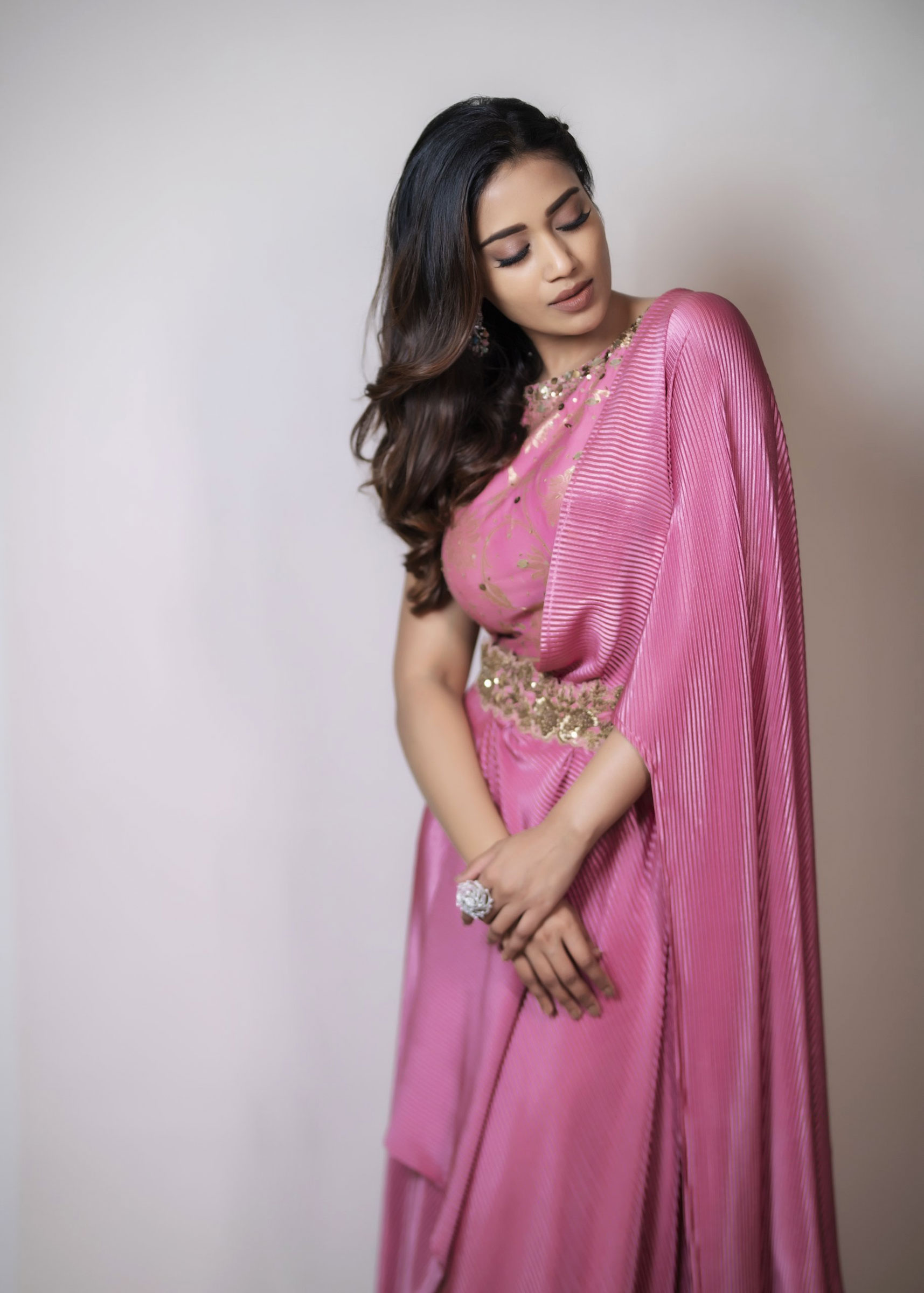 Nivetha Pethuraj in pink pleated drape saree photos - South Indian Actress