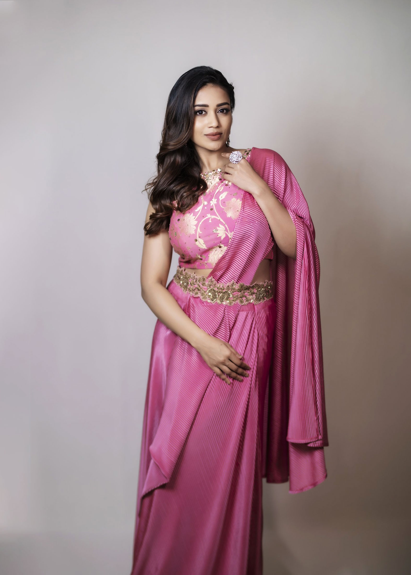 Nivetha Pethuraj in pink pleated drape saree photos - South Indian Actress
