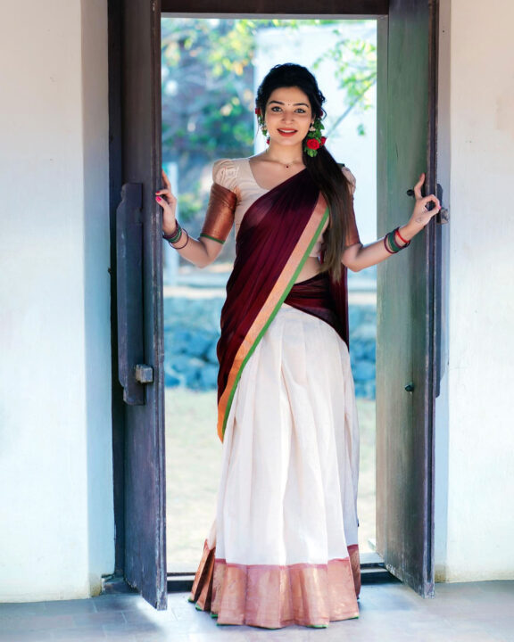 Dharsha Gupta in maroon half saree stills