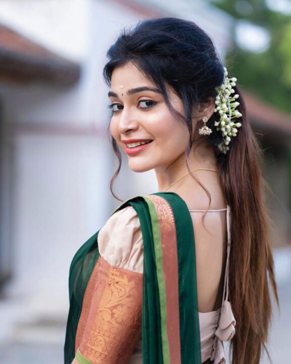 Dharsha Gupta in green half saree stills