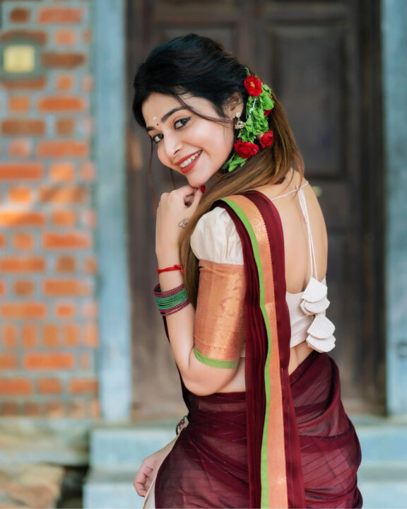 Dharsha Gupta in maroon half saree stills