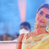 Pooja Hegde in saree stills at Acharya Movie Pre Release Event