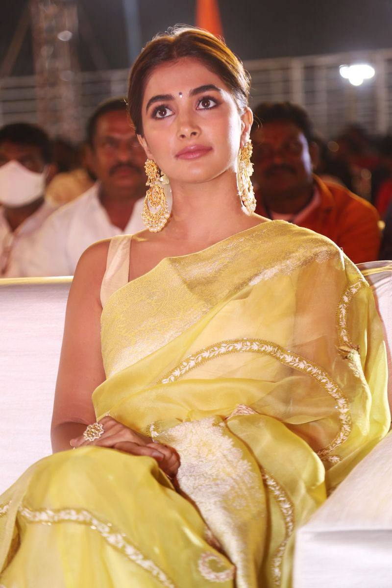 Pooja Hegde in saree stills at Acharya Movie Pre Release