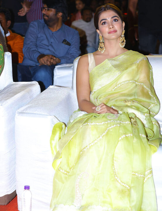 Pooja Hegde in saree stills at Acharya Movie Pre Release Event