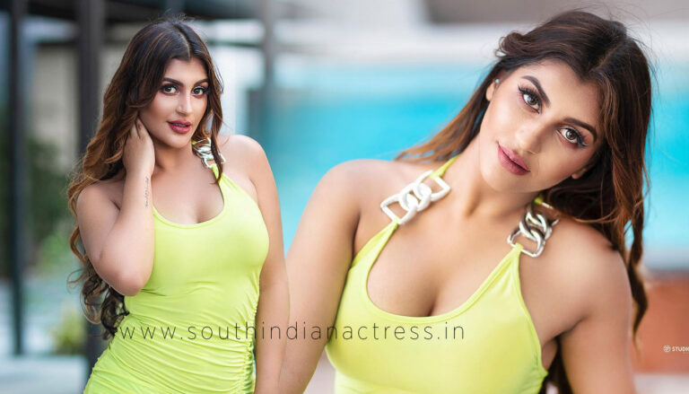 Yashika Anand hot stills in Green solid sheath dress