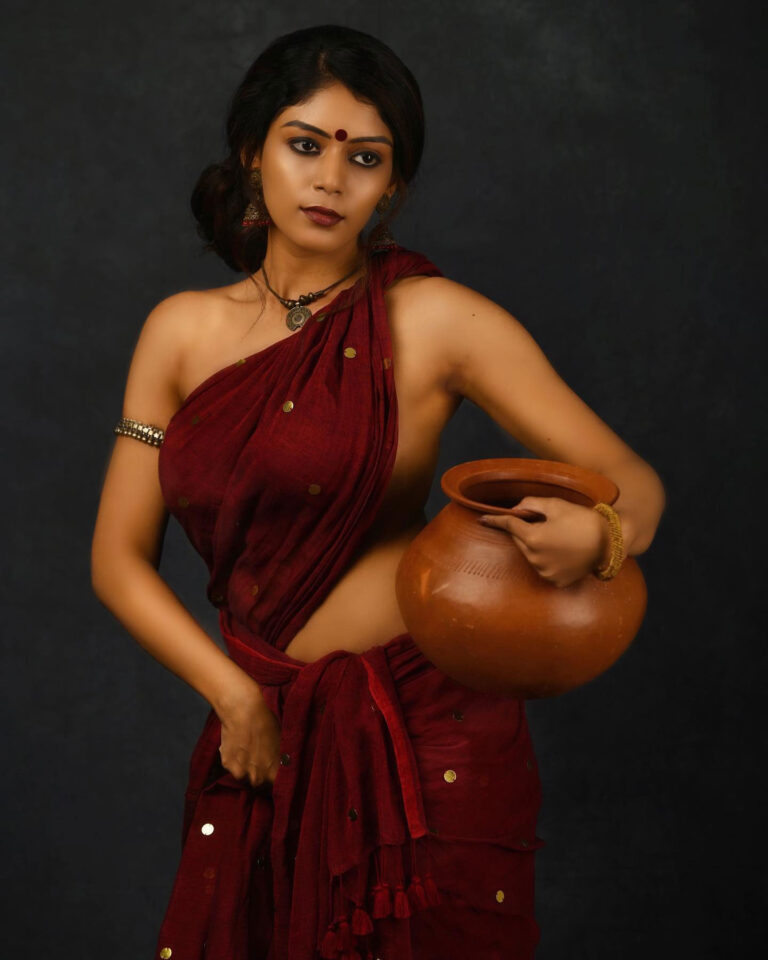 raksha-cherin-sizzling-in-blouse-less-saree-south-indian-actress
