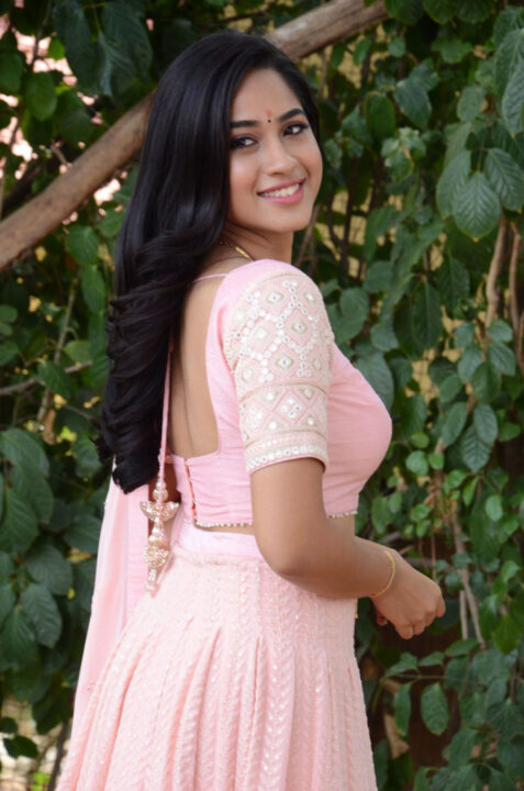 Rishika Lokre in pink lehenga stills at her Telugu debut movie launch