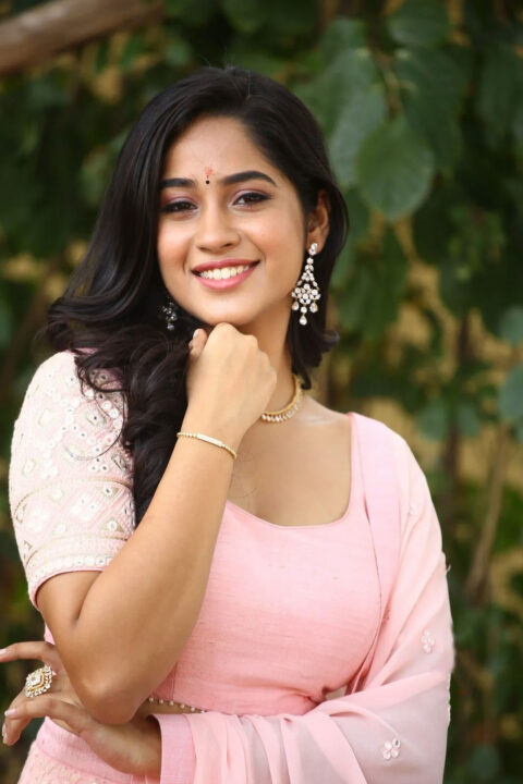 Rishika Lokre in pink lehenga stills at her Telugu debut movie launch