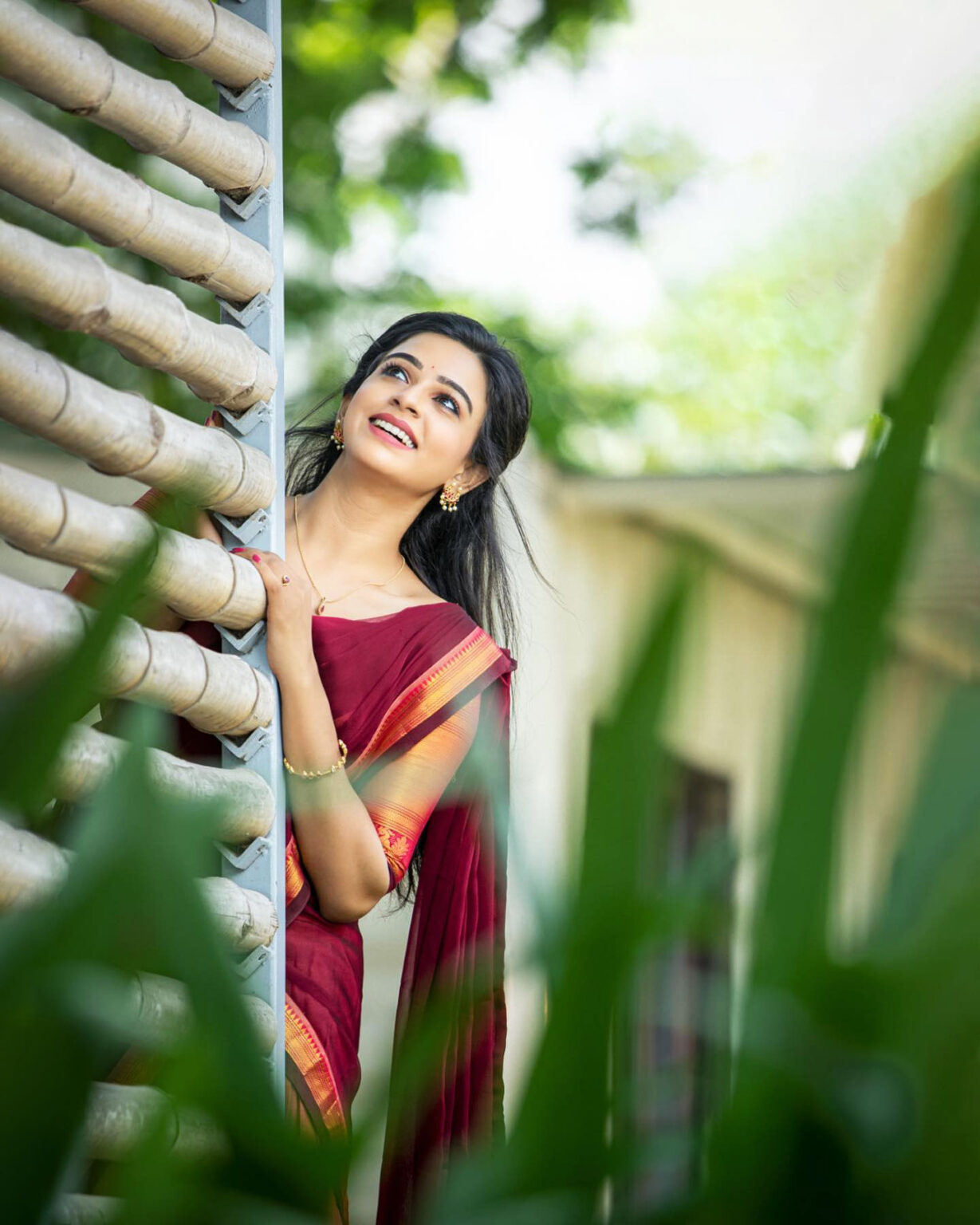 Divya Ganesh in half saree stills - South Indian Actress