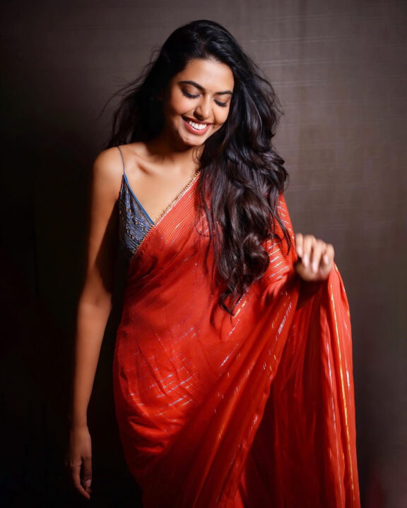 Shivani Rajashekar sizzles in red saree