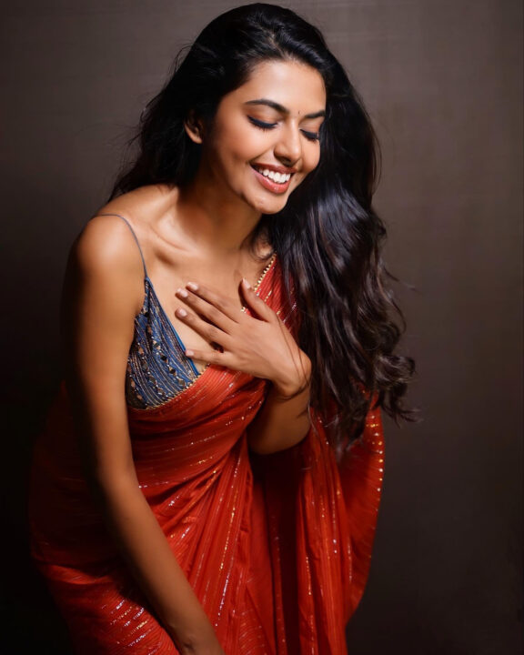 Shivani Rajashekar sizzles in red saree