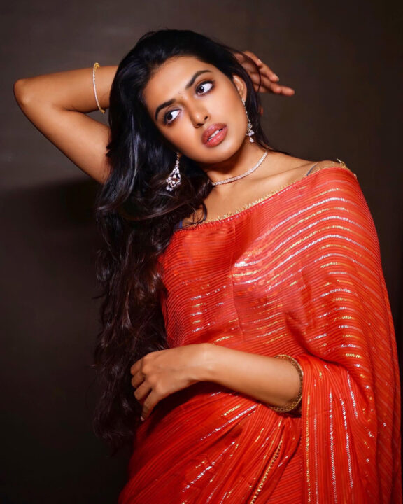 Shivani Rajashekar sizzles in red saree