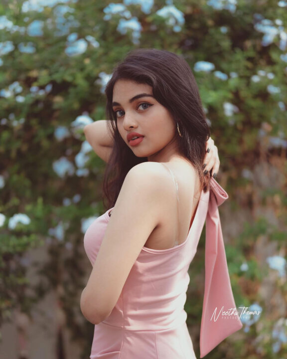 Aneena Angala Joseph stills in pink outfit