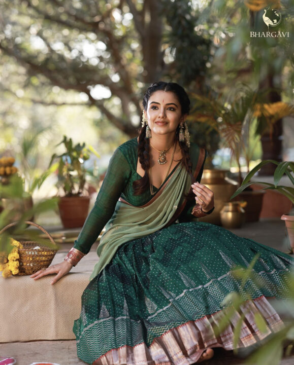 Malvika Sharma in green half saree