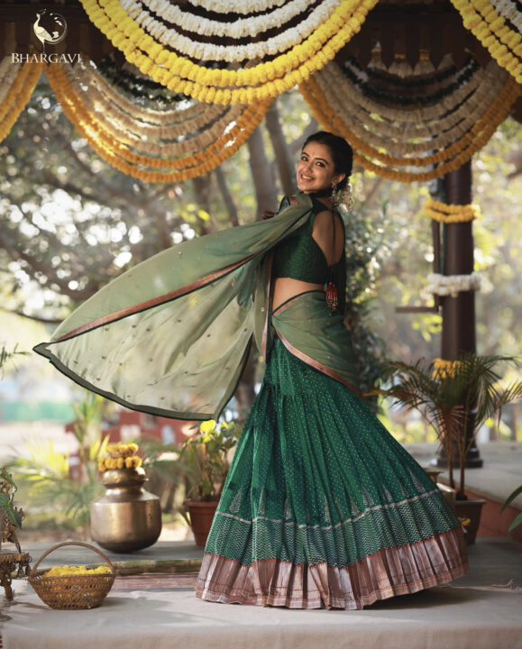 Malvika Sharma in green half saree stills