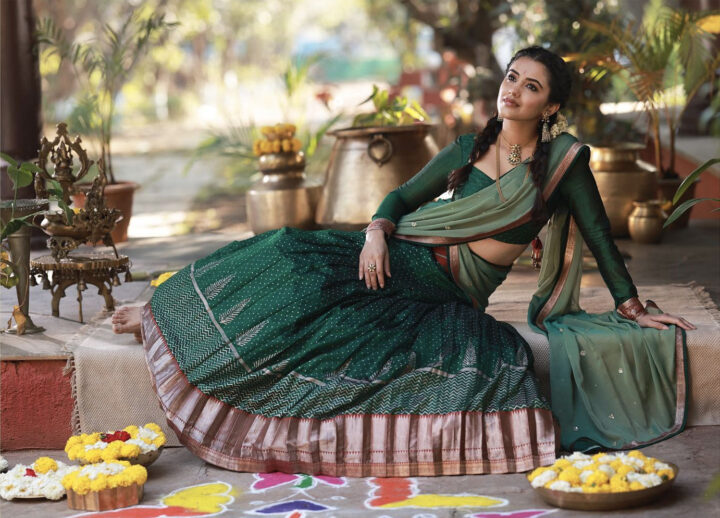 Malvika Sharma in green half saree stills