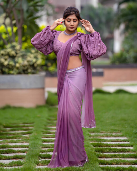 Vasanthi Krishnan in purple saree stills