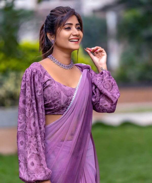 Vasanthi Krishnan in purple saree stills