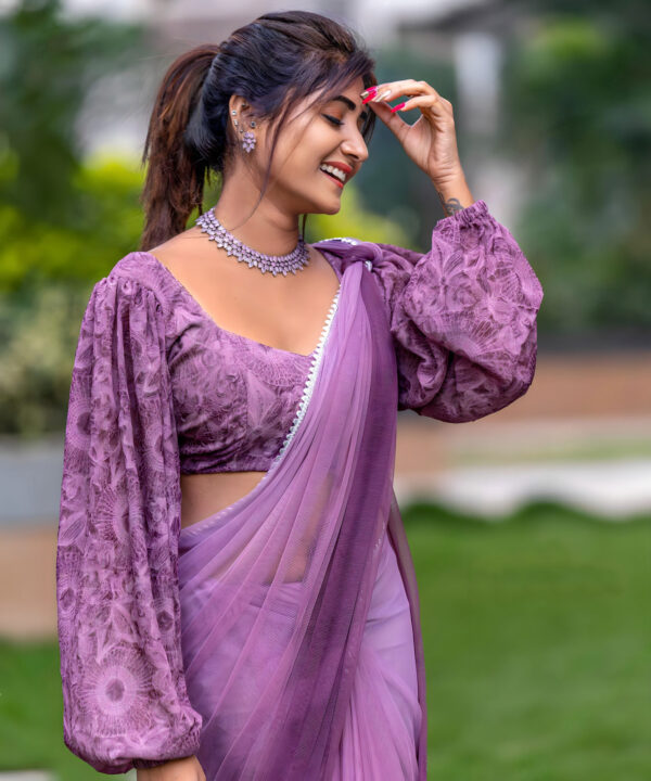 Vasanthi Krishnan in purple saree stills