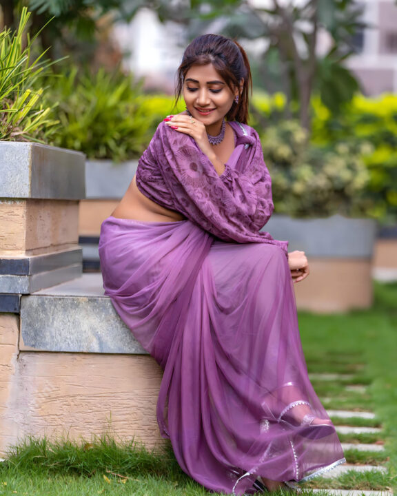 Vasanthi Krishnan in purple saree stills