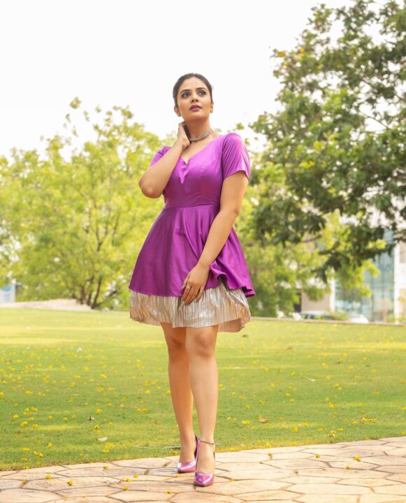 Sreemukhi in short dress photos