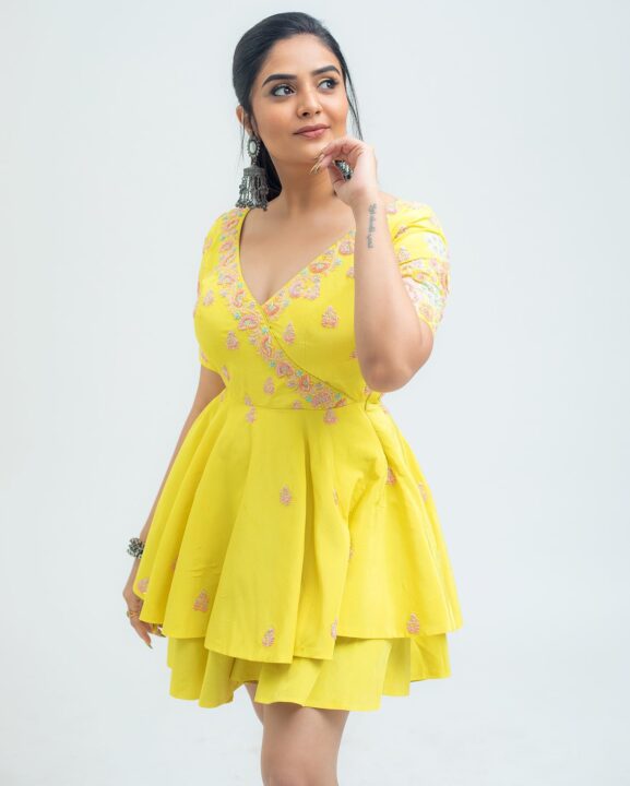 Sreemukhi in yellow short dress