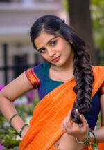 Varsha Dsouza in half saree photoshoot stills - South Indian Actress