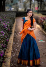Varsha Dsouza in half saree photoshoot stills - South Indian Actress