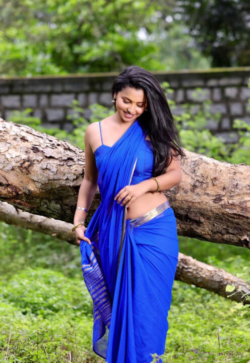 Anicka Vikramman hot navel stills in blue saree