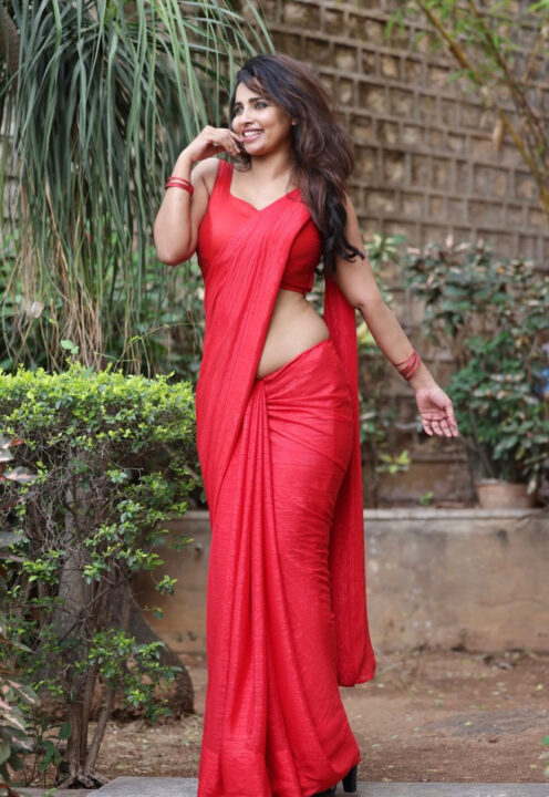 Anicka Vikramman hot stills in red saree