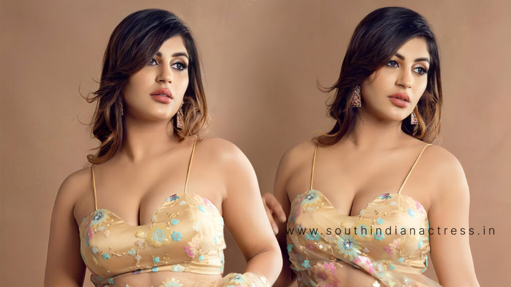 Yashika Aannand sizzles in transparent floral saree