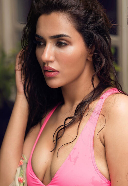 Akshara Gowda sizzles in pink swim suit