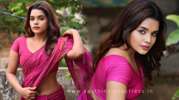 Veena Jessi glamorous stills in pink saree