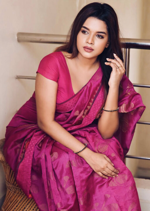 Veena Jessi glamorous stills in pink saree