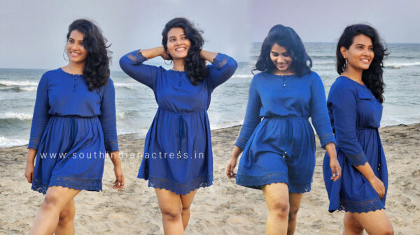 Dhivya Duraisamy in short dress at beach photos