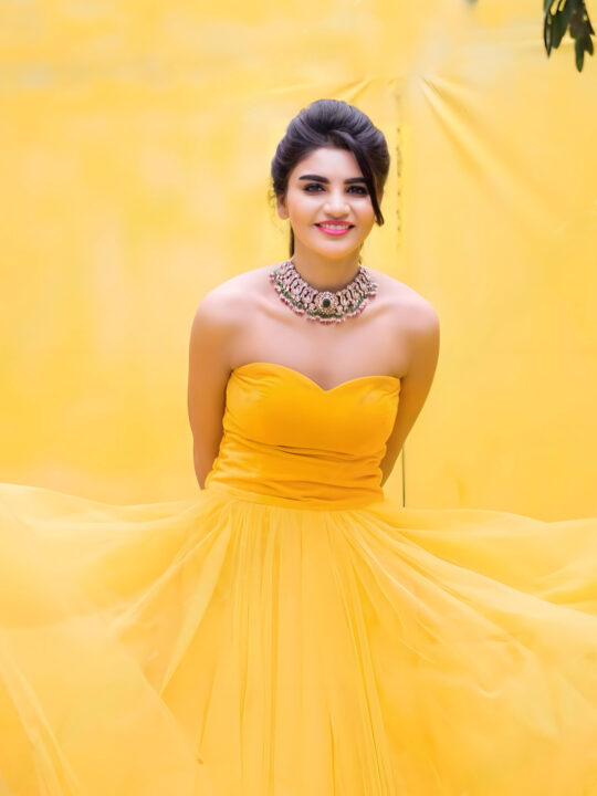 Jabardasth Varsha in yellow gown photoshoot