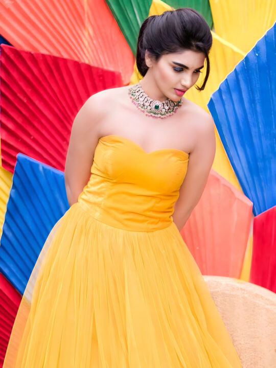 Jabardasth Varsha in yellow gown photoshoot