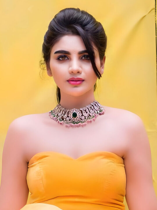 Jabardasth Varsha in yellow gown photoshoot