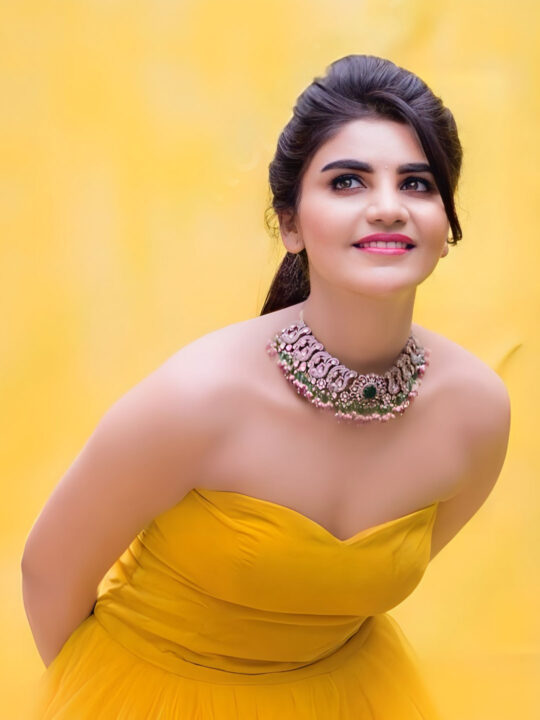 Jabardasth Varsha in yellow gown photoshoot