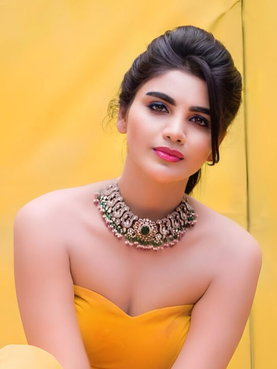 Jabardasth Varsha in yellow gown photoshoot