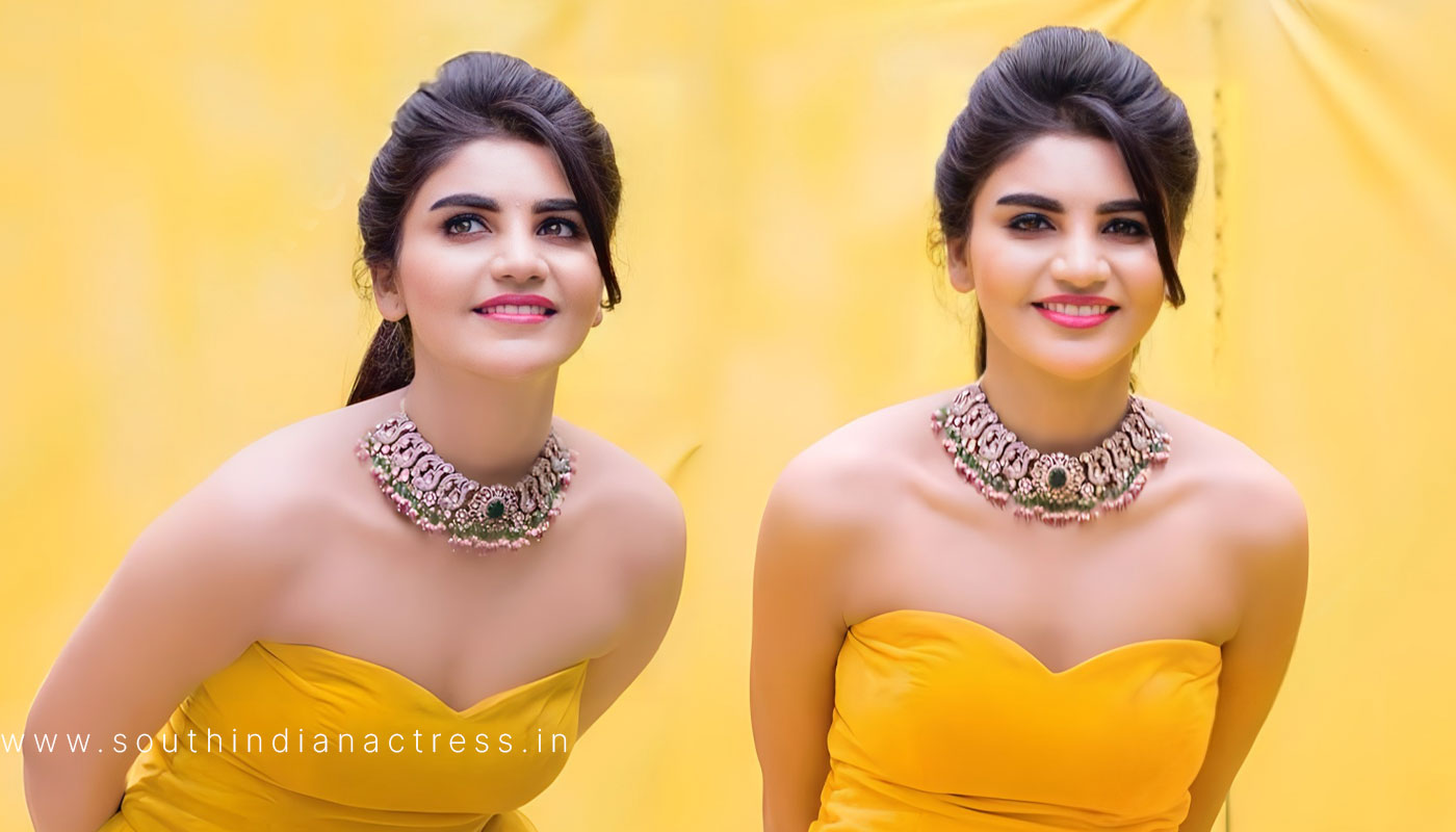 Jabardasth Varsha in yellow gown photoshoot